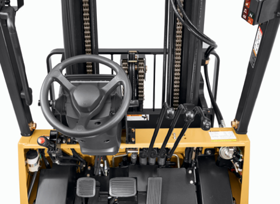 Side View of a Cat Cushion Tire Internal Combustion Forklift with Custom Forks